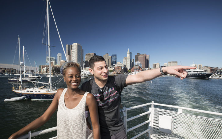 Two People Riding Park Ferry